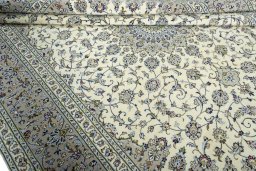 Close-up detail of 2000s Kashan rug from Iran / Persia showing Wool weave