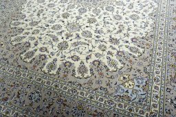 Close-up detail of 2000s Kashan rug from Iran / Persia showing Wool weave