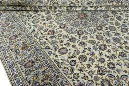 Close-up detail of 2000s Kashan rug from Iran / Persia showing Wool weave