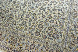 Close-up detail of 2000s Kashan rug from Iran / Persia showing Wool weave