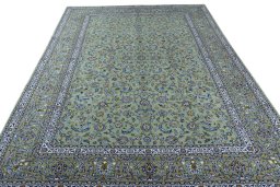 Surface texture of 2000s Kashan rug with natural Wool and intricate pattern