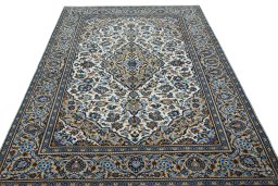 Surface texture of 2000s Kashan rug with natural Wool and intricate pattern