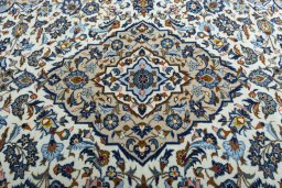 Central medallion detail of 2000s Kashan rug from Iran / Persia