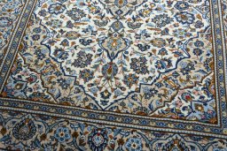 Close-up detail of 2000s Kashan rug from Iran / Persia showing Wool weave