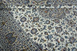 Close-up detail of 2000s Kashan rug from Iran / Persia showing Wool weave