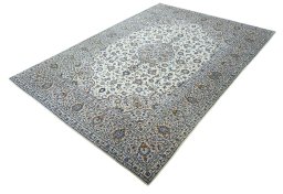 Corner detail of 2000s Kashan rug showing border pattern and Wool pile