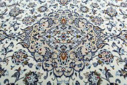 Central medallion detail of 2000s Kashan rug from Iran / Persia
