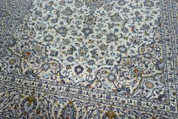 Close-up detail of 2000s Kashan rug from Iran / Persia showing Wool weave