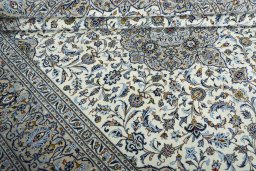 Close-up detail of 2000s Kashan rug from Iran / Persia showing Wool weave