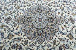 Central medallion detail of 2000s Kashan rug from Iran / Persia