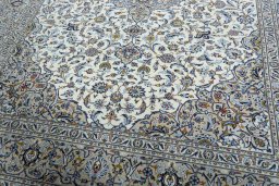 Close-up detail of 2000s Kashan rug from Iran / Persia showing Wool weave