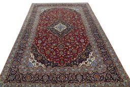 Surface texture of 2000s Kashan rug with natural Cork and intricate pattern