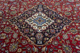 Central medallion detail of 2000s Kashan rug from Iran / Persia