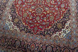 Close-up detail of 2000s Kashan rug from Iran / Persia showing Cork weave