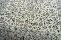 Close-up detail of 2000s Kashan rug from Iran / Persia showing Wool weave