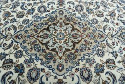 Central medallion detail of 2000s Kashan rug from Iran / Persia
