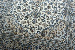 Close-up detail of 2000s Kashan rug from Iran / Persia showing Wool weave
