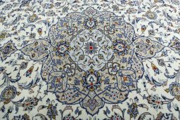 Central medallion detail of 2000s Kashan rug from Iran / Persia