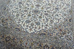 Close-up detail of 2000s Kashan rug from Iran / Persia showing Wool weave