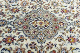 Central medallion detail of 2000s Kashan rug from Iran / Persia