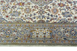 Full view of 2000s Kashan rug from Iran / Persia, 226 × 140 cm in Beige tones