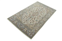 Corner detail of 2000s Kashan rug showing border pattern and Wool pile