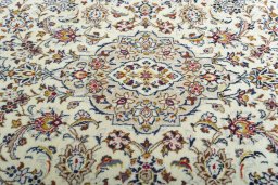 Central medallion detail of 2000s Kashan rug from Iran / Persia