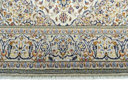 Close-up detail of 2000s Kashan rug from Iran / Persia showing Wool weave
