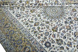Close-up detail of 2000s Kashan rug from Iran / Persia showing Wool weave