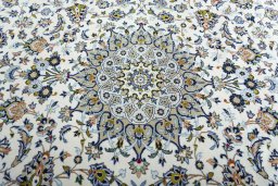 Central medallion detail of 2000s Kashan rug from Iran / Persia