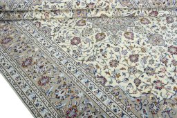 Close-up detail of 2000s Kashan rug from Iran / Persia showing Wool weave