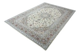 Corner detail of 2000s Kashan rug showing border pattern and Wool pile