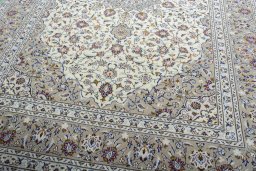 Close-up detail of 2000s Kashan rug from Iran / Persia showing Wool weave