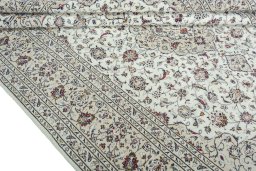 Close-up detail of 2000s Kashan rug from Iran / Persia showing Wool weave