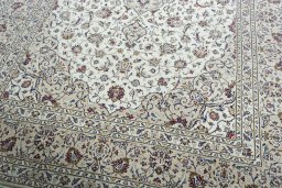 Close-up detail of 2000s Kashan rug from Iran / Persia showing Wool weave