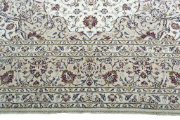 Full view of 2000s Kashan rug from Iran / Persia, 351 × 250 cm in Beige tones