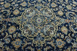 Central medallion detail of 2000s Kashan rug from Iran / Persia