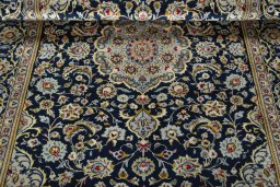 Close-up detail of 1970s Kashan rug from Iran / Persia showing Wool weave