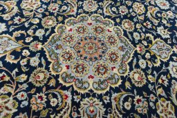 Central medallion detail of 1970s Kashan rug from Iran / Persia