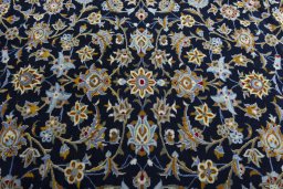Central medallion detail of 2000s Kashan rug from Iran / Persia