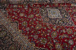 Close-up detail of 2000s Kashan rug from Iran / Persia showing Wool weave