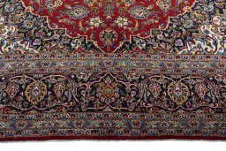 Full view of 2000s Kashan rug from Iran / Persia, 420 × 295 cm in Red tones