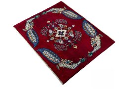 Corner detail of 2000s Kashan rug showing border pattern and Wool pile