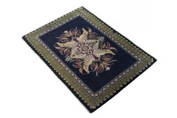 Corner detail of 2000s Kashan rug showing border pattern and Wool pile