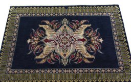 Surface texture of 2000s Kashan rug with natural Wool and intricate pattern