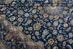 Close-up detail of 2000s Kashan rug from Iran / Persia showing Wool weave