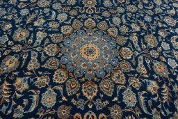 Central medallion detail of 2000s Kashan rug from Iran / Persia