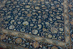 Close-up detail of 2000s Kashan rug from Iran / Persia showing Wool weave