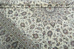 Close-up detail of 2000s Kashan rug from Iran / Persia showing Wool weave
