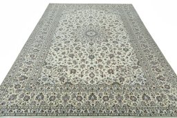 Surface texture of 2000s Kashan rug with natural Wool and intricate pattern